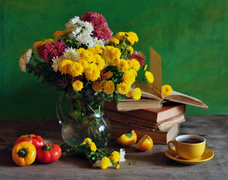 Still life with chrysanthemums and books