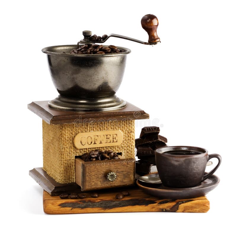 Still life with cup of coffee and coffee-mill