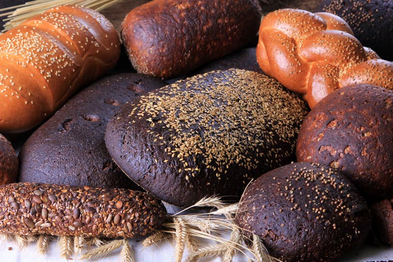 Still Life with Different Types of Bread Black, Rye, White Bread