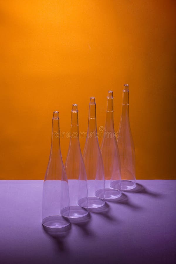 Still life with figures of conical shape on a colored background royalty free stock photos