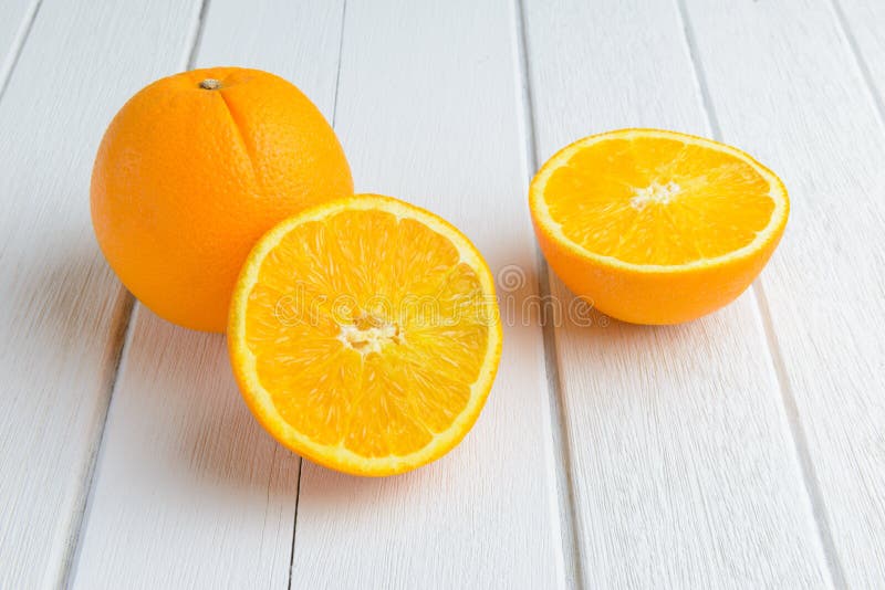 Still Life Fresh Orange Fruit on Vintage White Wood Table Stock Photo