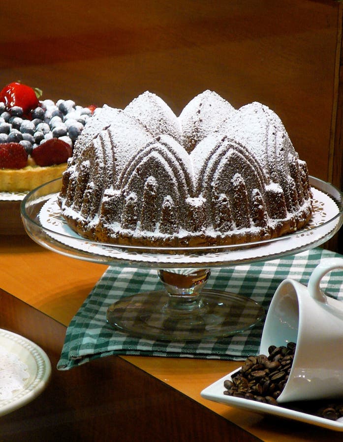 Still Life of Gourmet Chocolate Cake, Fruit Tart, and Coffee