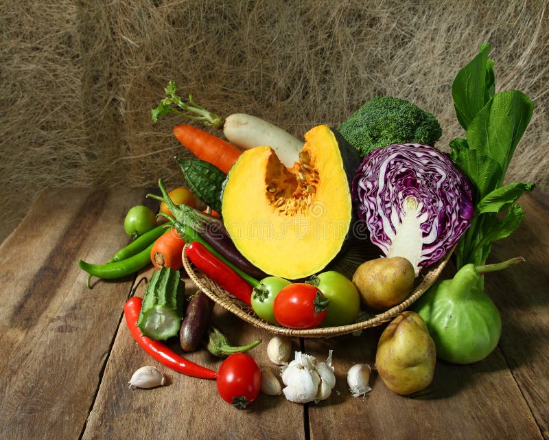 Still life harvested vegetables agricultural on wooden background