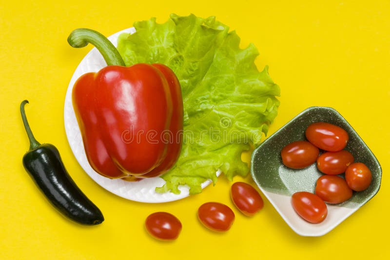 Still life of jalapeno pepper, bell pepper, tomato cherry, lettuce royalty free stock image Still life of jalapeno pepper, bell pepper, tomato cherry, lettuce royalty free stock image