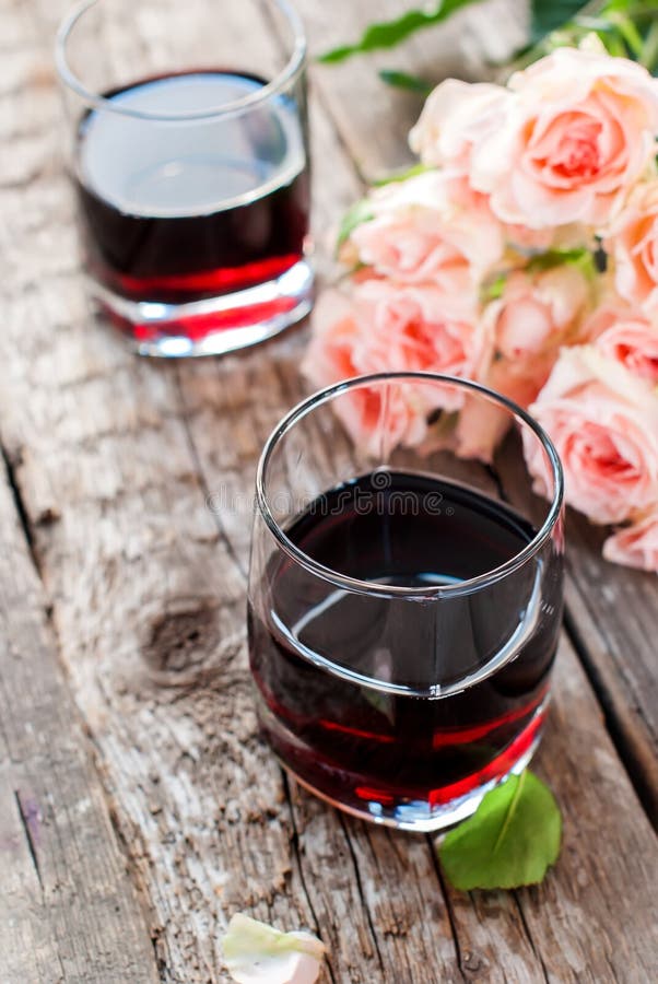 Still Life with Red Wine and Bouquet of Roses