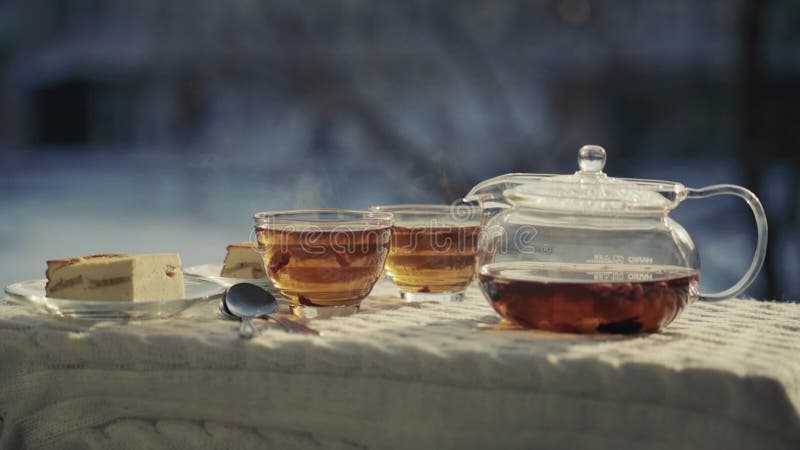 Still life with Smoky tea and dessert in the open cold air