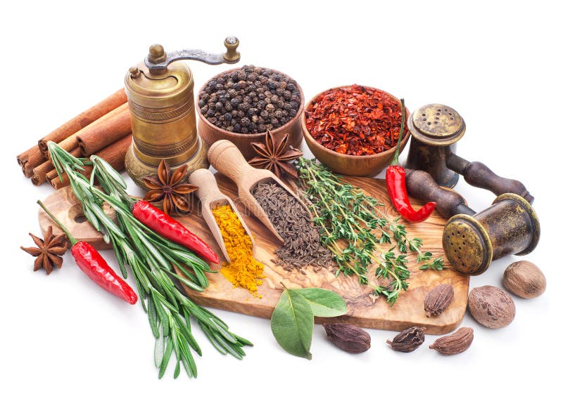 Still life with spices and herbs isolated on white