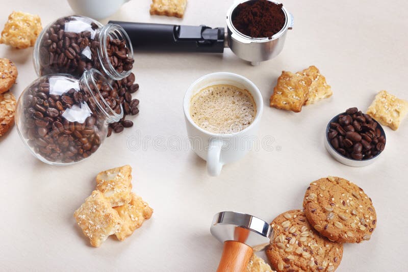 Still Life with Sweets, Cup of Espresso, Coffee Beans and Ground Coffee