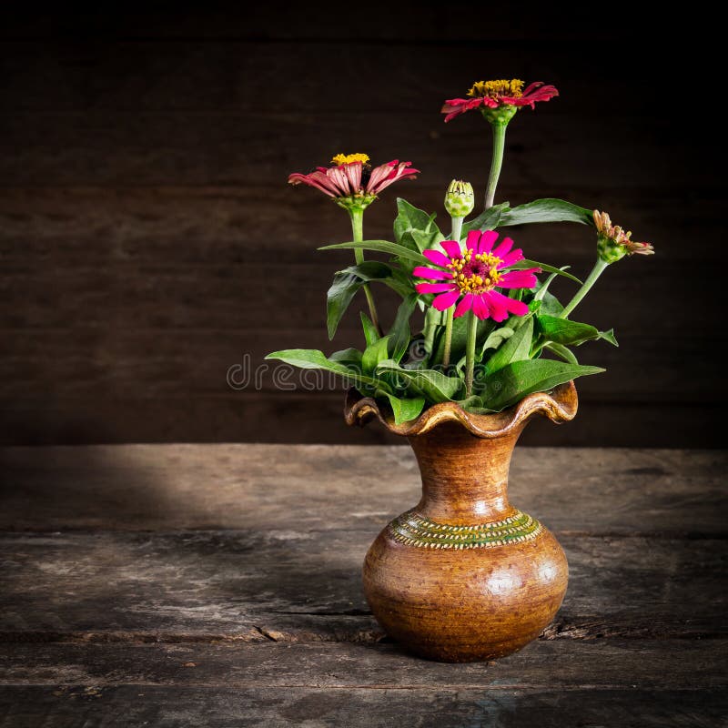 Still Life with a vase flower,earthenware