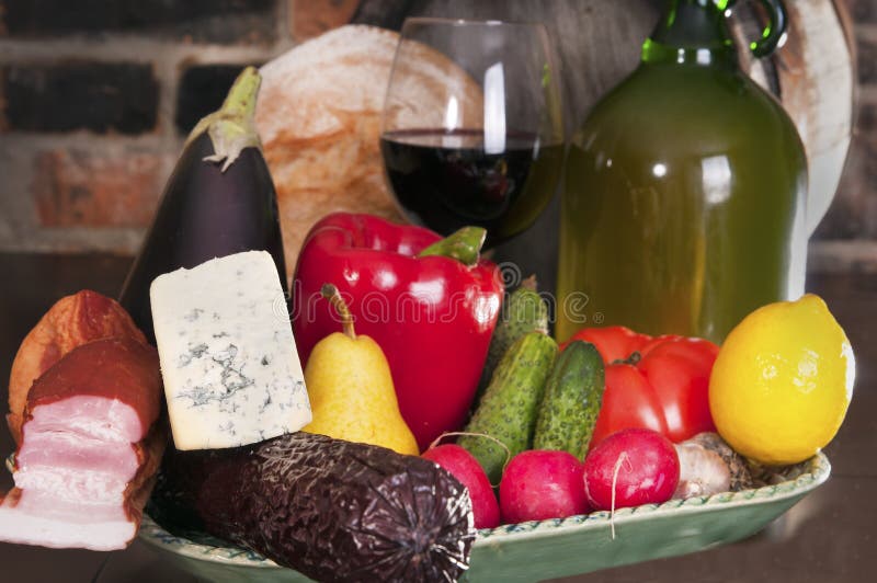 Still life with wine and some fruits