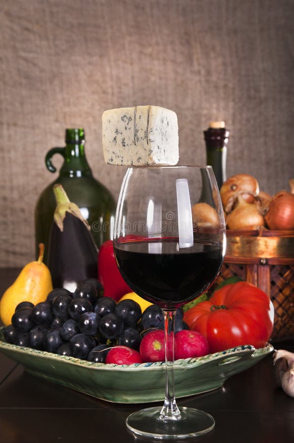 Still life with wine and some fruits,vegetables