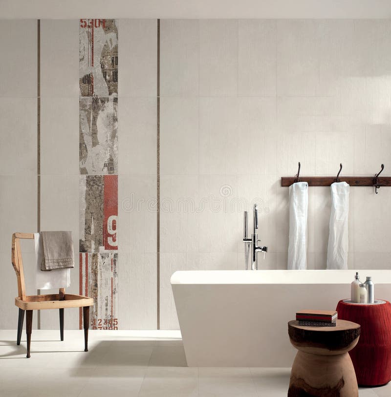 Interior of this luxurious bathroom features white glossy marble on the walls and floors, a white bathtub with a golden plate coating, a white basin, wooden furniture, and a window. 3D Rendering. Interior of this luxurious bathroom features white glossy marble on the walls and floors, a white bathtub with a golden plate coating, a white basin, wooden furniture, and a window. 3D Rendering