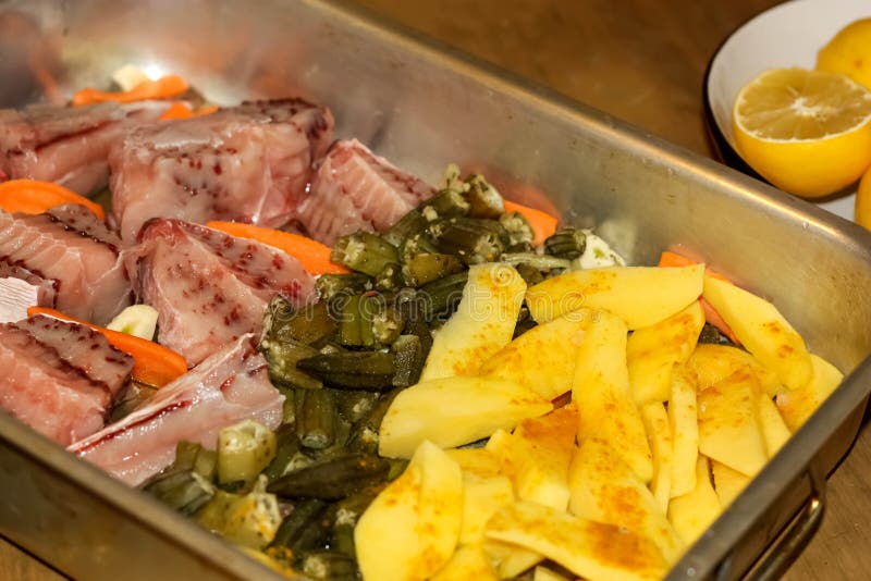 Stingray-fish slices with okra and potatoes. Stingray dish stock images, royalty-free photos and pictures