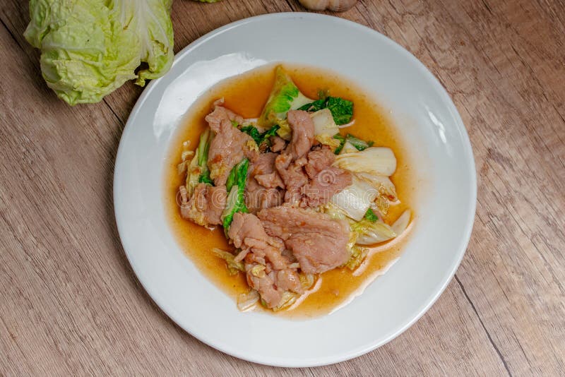 Stir Fried Cabbage with Pork in a White Plate Stock Image - Image of