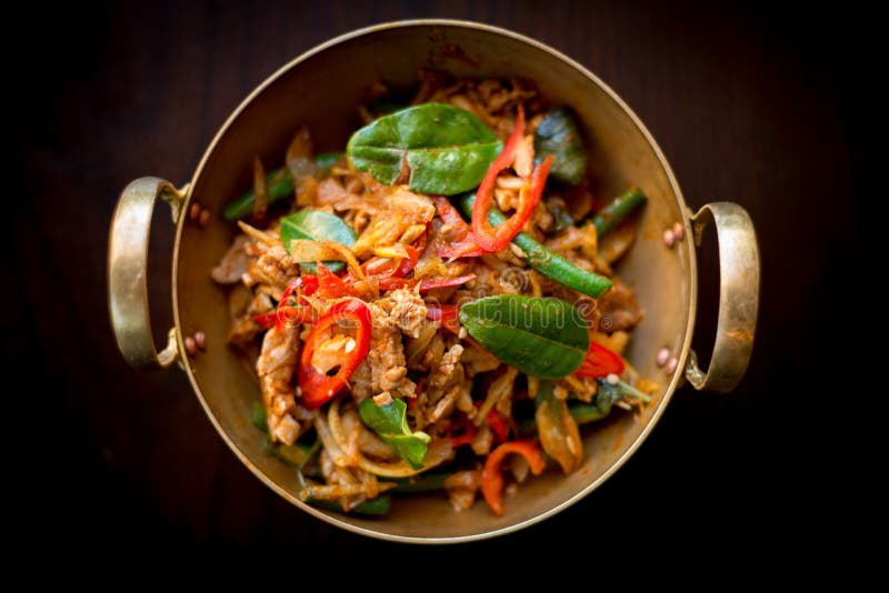 Stir fried chicken with Thai herbs.