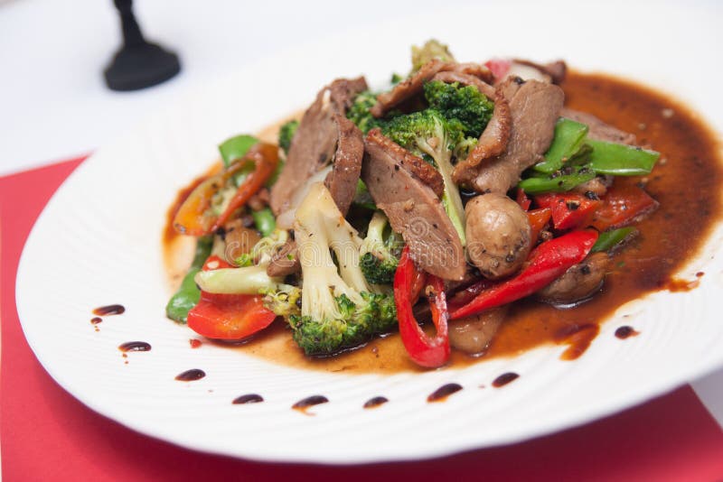 Stir fried grill duck with black pepper.