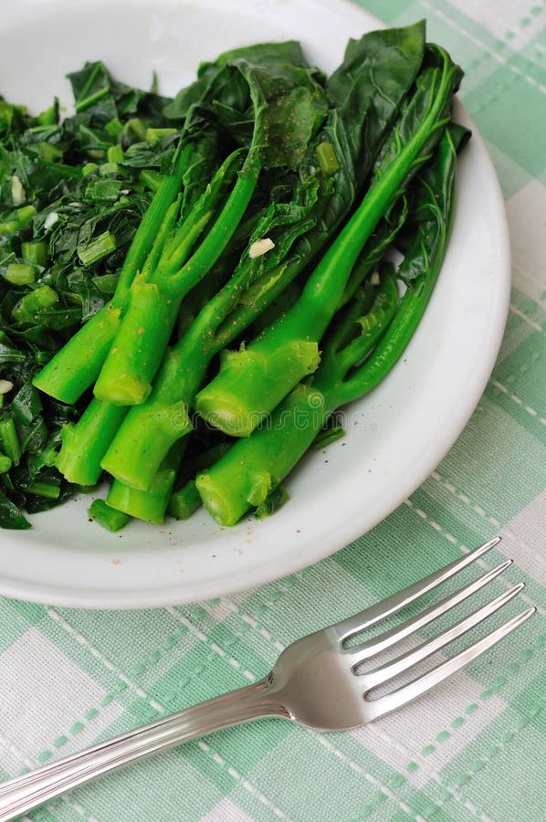 Stir fried leafy vegetables stock photos