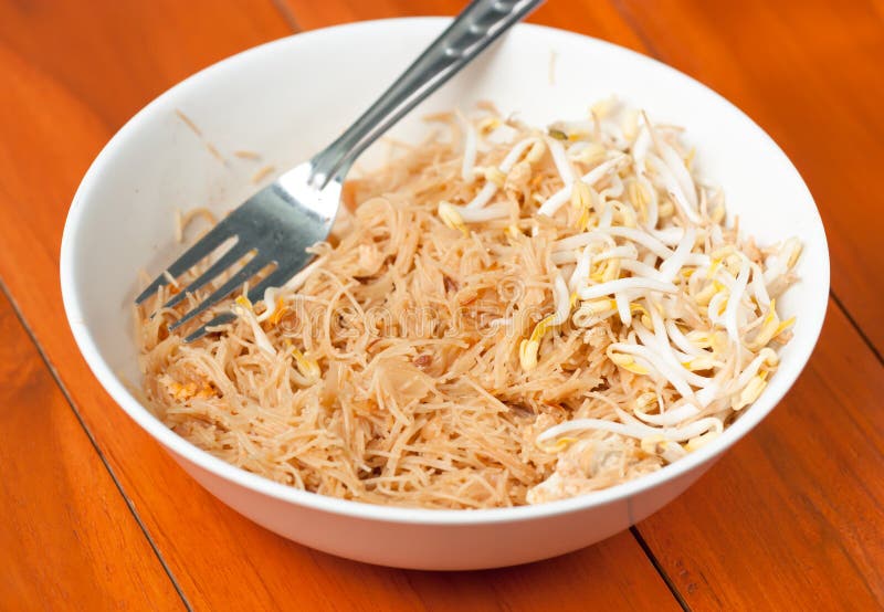 Stir Fried Mung Bean Noodle in Bowl on the Wooden Table Stock Image