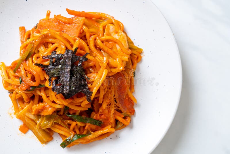 Stir-fried Noodles with Korean Spicy Sauce and Vegetable Stock Photo