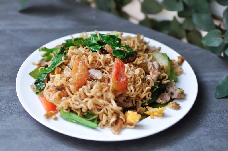 Stir Fried Noodles with Pork and Vegetable in the Box Stock Image