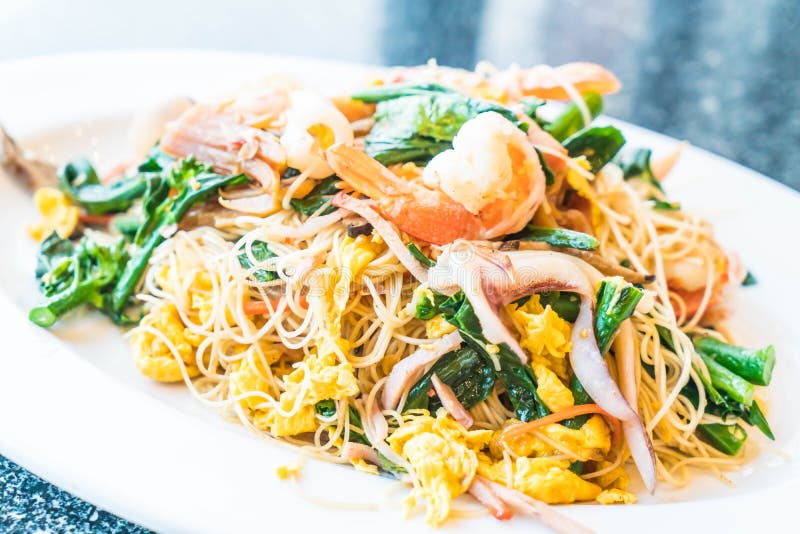 Stir Fried Noodles with Seafood and Mixed Vegetables Stock Photo