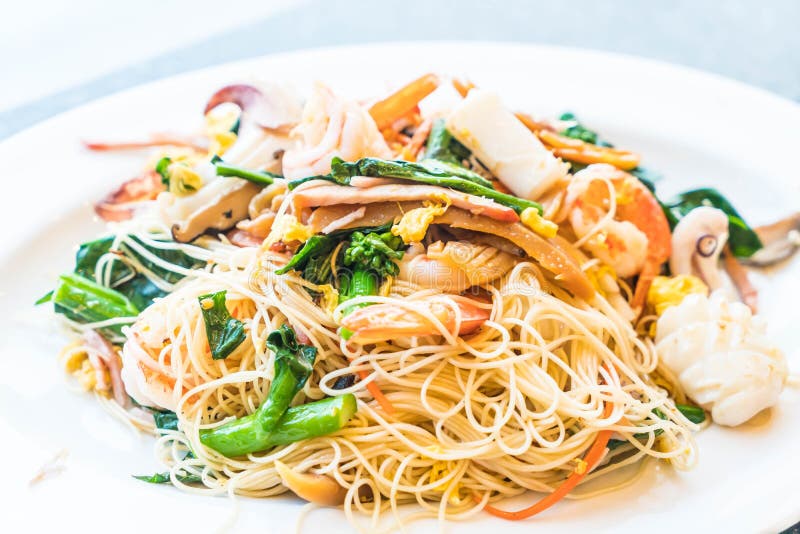 Stir Fried Noodles with Seafood and Mixed Vegetables Stock Image