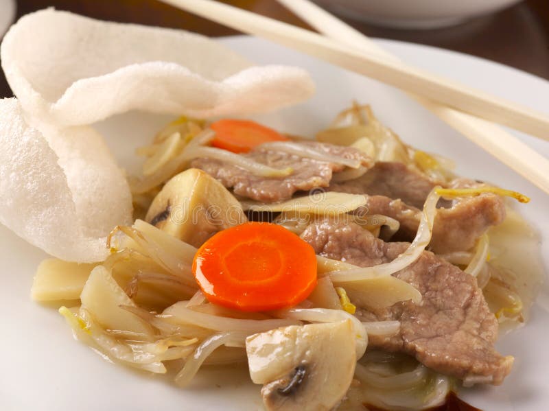 Stir Fried Pork, Vegetables and Crackers Stock Photo - Image of food