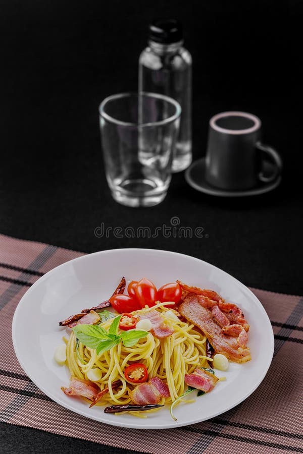 StirFried Spaghetti with Dried Chili and Crispy Bacon Stock Image