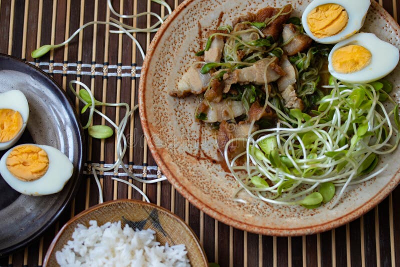 Stirfried Sunflower Sprout with Crispy Pork with Boiled Egg and