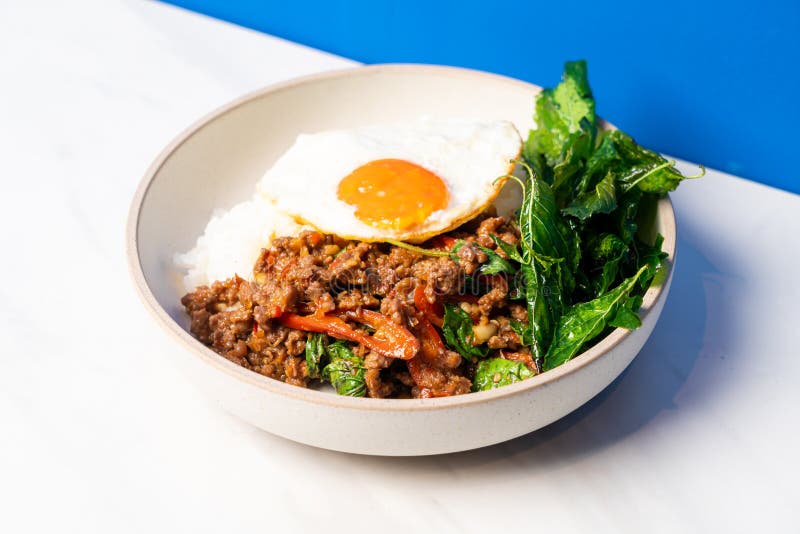 Stir Fried Thai Basil with Wagyu Beef and Fried Egg Stock Photo Image