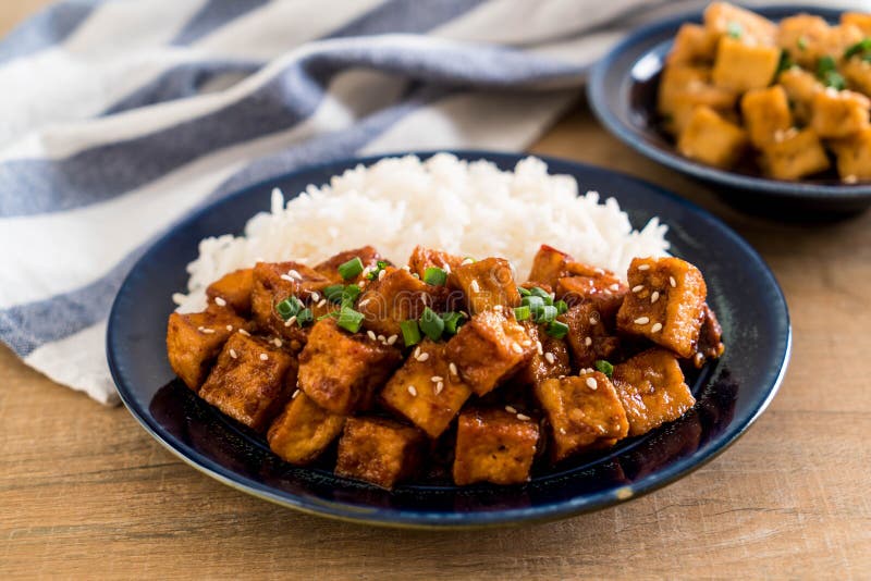 Stir Fried Tofu with Spicy Sauce on Rice Stock Photo - Image of sauce