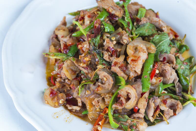 Stir fried wild boar with red curry stock photo