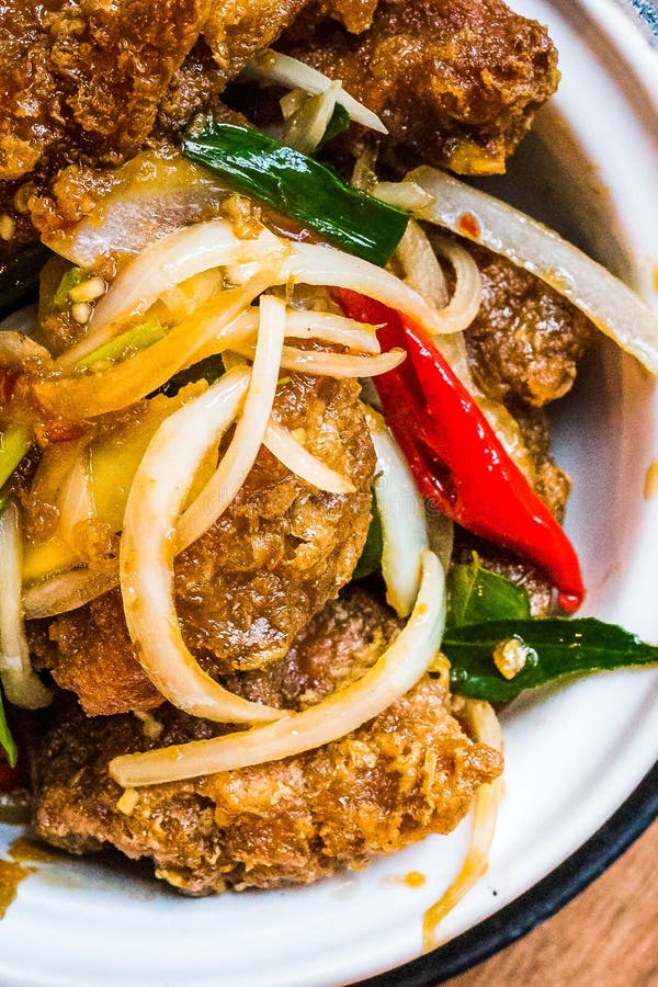 Stir Fry Crispy Golden Fried Chicken with Chilli, Onions and Spring