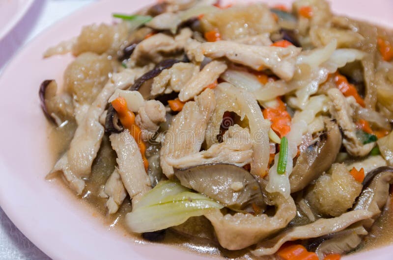 Stir Fry Fish Maw with Egg and Vegetable in Chinese Style. Stock Image