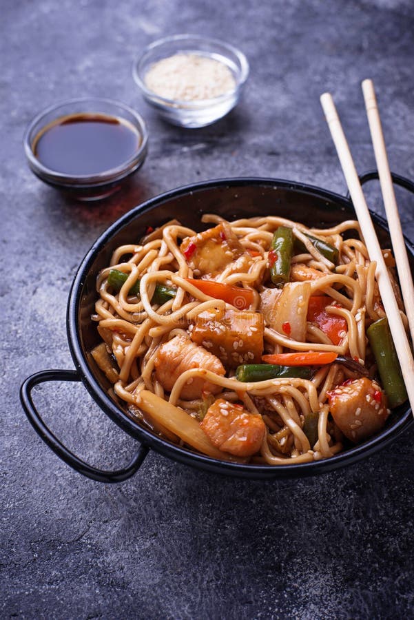 Stir Fry Noodles with Chicken, Tofu and Vegetable. Stock Photo - Image