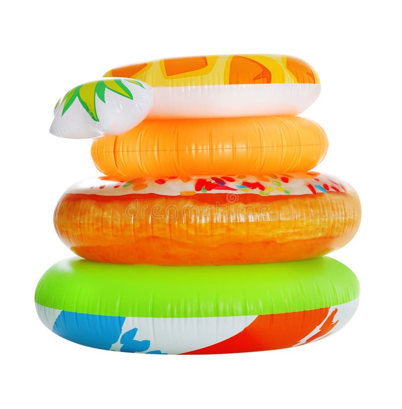 Stivă de inele colorate gonflabile pe alb stock photography