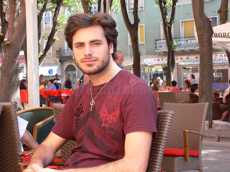 Cello star Stjepan Hauser from duo 2Cellos, sitting in a bar in his hometown Pula, Croatia. Cello star Stjepan Hauser from duo 2Cellos, sitting in a bar in his hometown Pula, Croatia