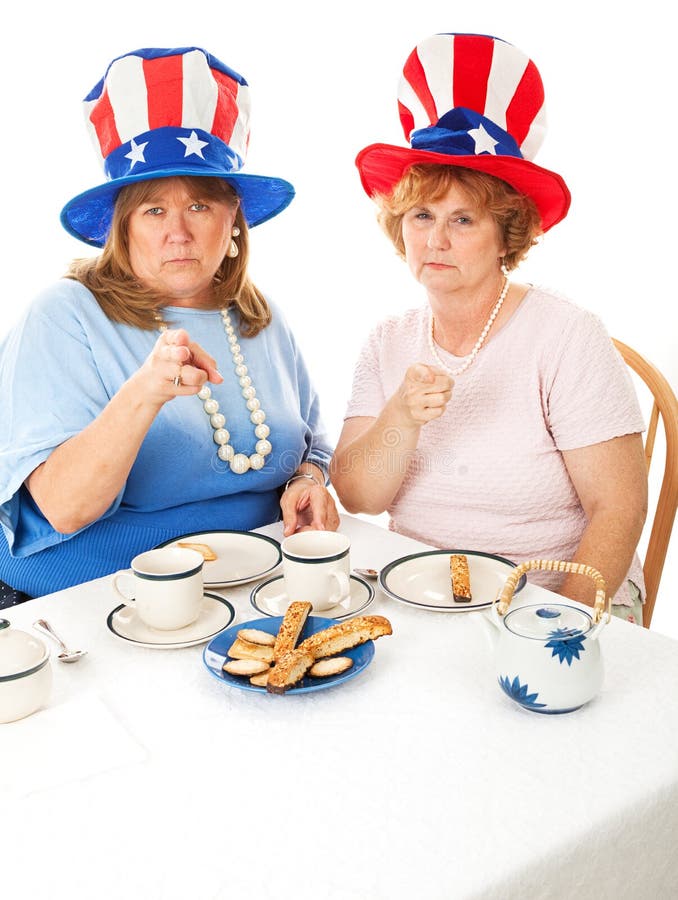 Two angry conservative voters having an actual tea party. White background. Room for text at the bottom of frame. Two angry conservative voters having an actual tea party. White background. Room for text at the bottom of frame.