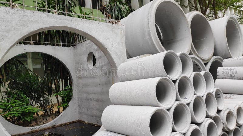 Concrete drainage pipes are stacked for construction. Stock Photo -Concrete drainage pipes are stacked for construction in the construction area royalty free stock photography Concrete drainage pipes are stacked for construction. Stock Photo -Concrete drainage pipes are stacked for construction in the construction area royalty free stock photography