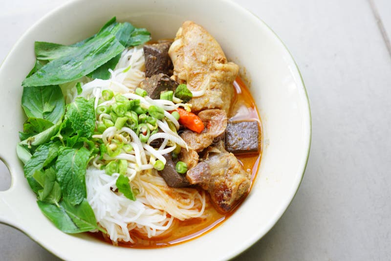 Stock Photo - Thai Rice Noodle with Chicken Curry Red Soup Stock Photo ...