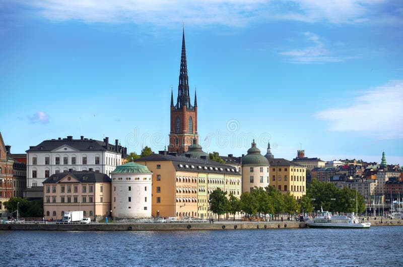 STOCKHOLM, SWEDEN - AUGUST 20, 2016: Tourists boat and View of G