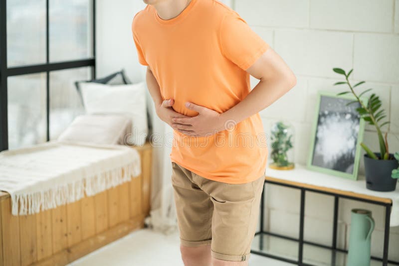 Stomach Ache, Man with Abdominal Pain Suffering at Home Stock Image Image of abdominal