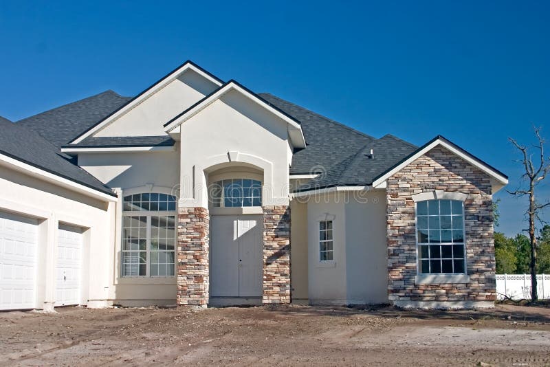 Stone accents new home stock image. Image of design, exterior 1450331