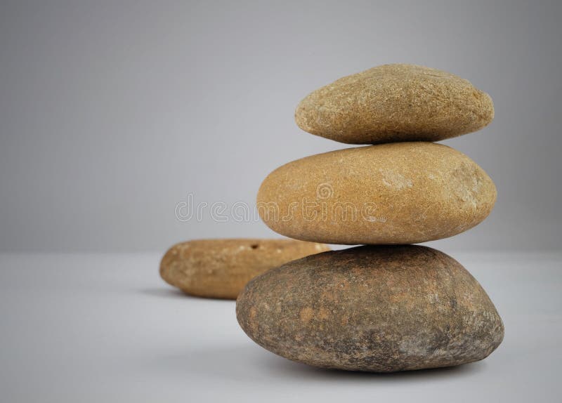 Stone Balance on Gray Background Stock Image Image of rock