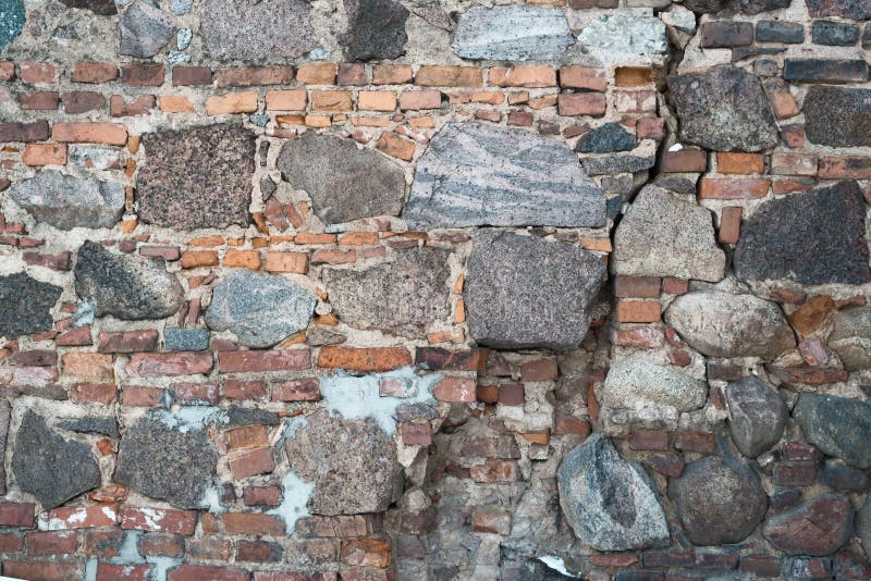 Stone and brick old wall as abstract background