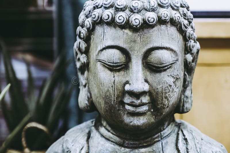 Stone Buddha Face Statue - Zen and Peace Symbol Stock Image - Image of ...
