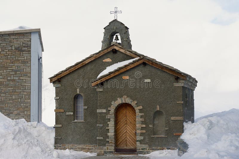 Stone chapel at the Gornergratbahn upper station in winter in Zermatt, Switzerland.