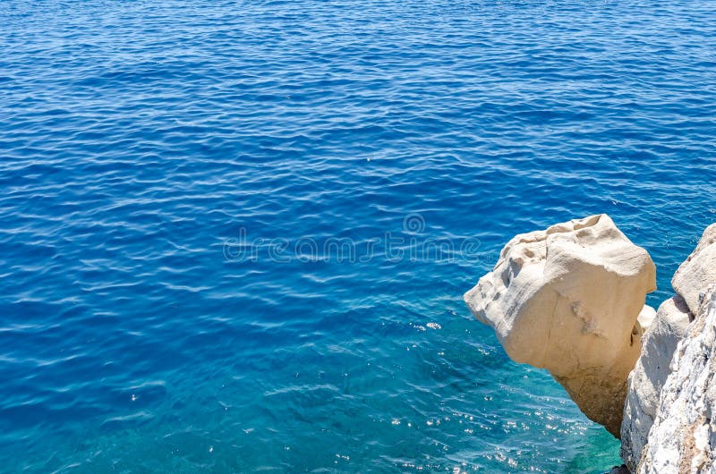 Stone cliff or rock ledge above the blue sea. royalty free stock photo Stone cliff or rock ledge above the blue sea. royalty free stock photo