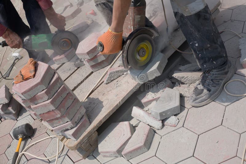 Stone Cutter stock photo. Image of paving, sett, action 14697096