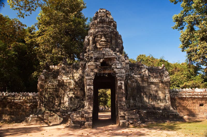 Stone face entrance gate,angkor wat cambodia.